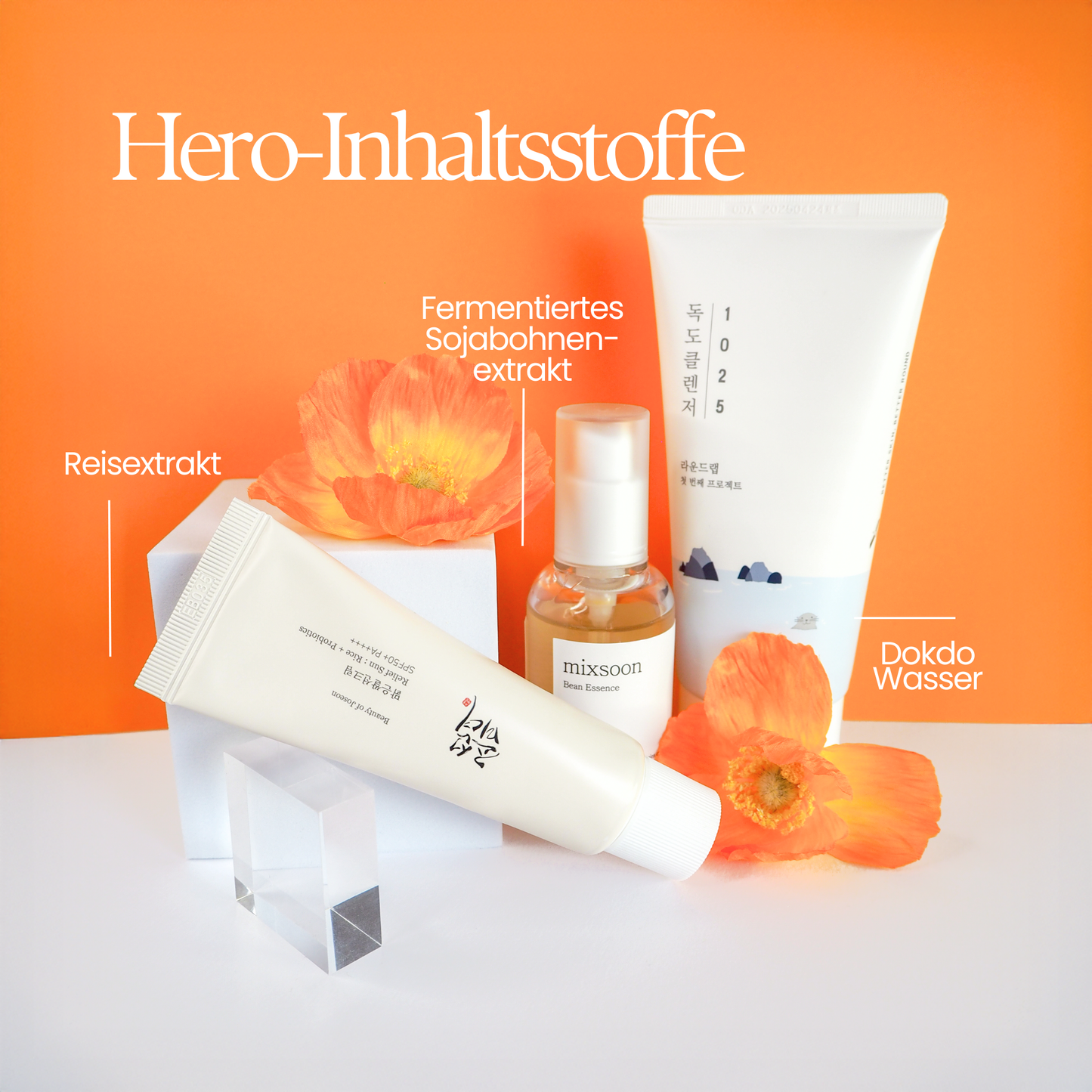 Orangen Hintergrund mit den drei Produkten in der Mitte mit den Hero Inhaltsstoffe